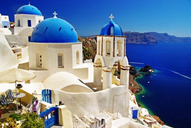 White-blue Santorini - view of caldera with churches clipart