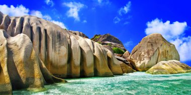 Seychelles islands with unique granite rocks clipart