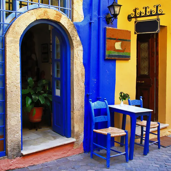 Traditional greek streets with small tavernas — Stock Photo, Image