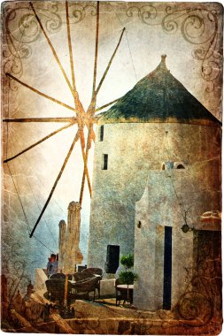 Old windmill on Santorini - picture in retro style clipart