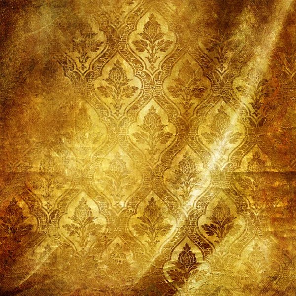 Golden folded background with classic patterns — Stock Photo, Image