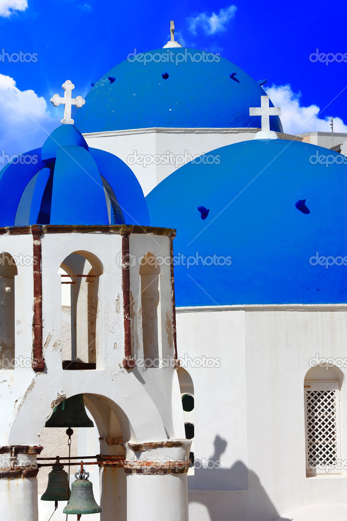 Blue churches domes - symbol of unique Santorini