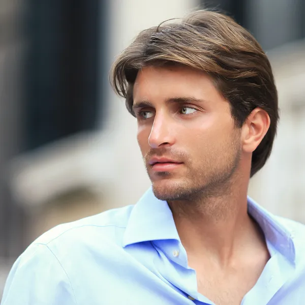 Portrait of young handsome man outside — Stock Photo, Image