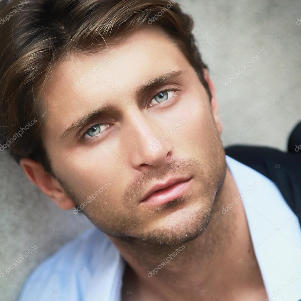 Premium Photo  Portrait of young attractive man with blue eyes