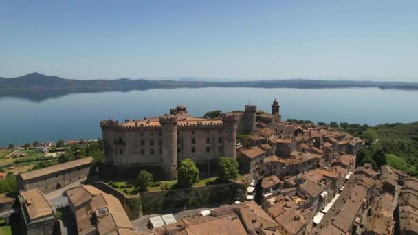 Lago Escénico Hermosa Ciudad Medieval Bracciano Italia Vista Aérea Del — Vídeos de Stock