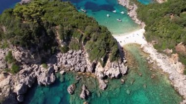 Corfu island, Greece . Aerial view of beautiful double beach with turquoise clear waters Limni beach Glyko near Paleokastritsa