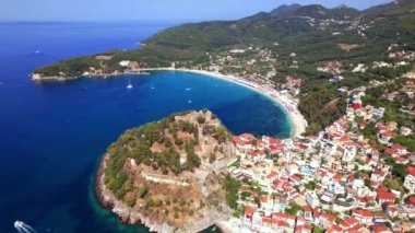 Aerial drone video of Parga colorful town and popular tourist resort in Epirus, Greece
