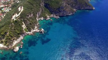 Aerial drone video of Parga colorful town and popular tourist resort in Epirus, Greece