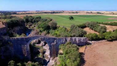 Vulci Archeological and Nature Park. Aerial view of Castello dell'Abbadia and ancient bridge of etruscan city Vulci Viterbo province, Lazio, Italy