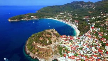 Aerial drone video of Parga colorful town and popular tourist resort in Epirus, Greece
