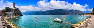 Amazing italian lakes scenery - beautiful Lago di Garda. panoramic view of Malcesine castle and beach 