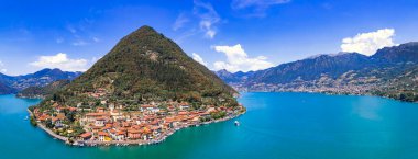 Italian lakes scenery. Magic Iseo lake .Aerial drone view of beautiful Monte Isola island and Peschiera Maraglio village. Italy, Brescia province
