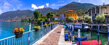 İtalyan gölü manzarası. Sihirli Iseo Gölü. Güzel Monte Isola adası ve Peschiera Maraglio köyü. İtalya, Brescia Eyaleti