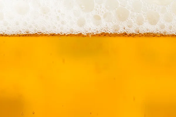 Beer with foam in the glass — Stock Photo, Image