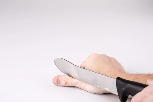 Close up of a suicidal man hand on isolated white background — Stock Photo, Image