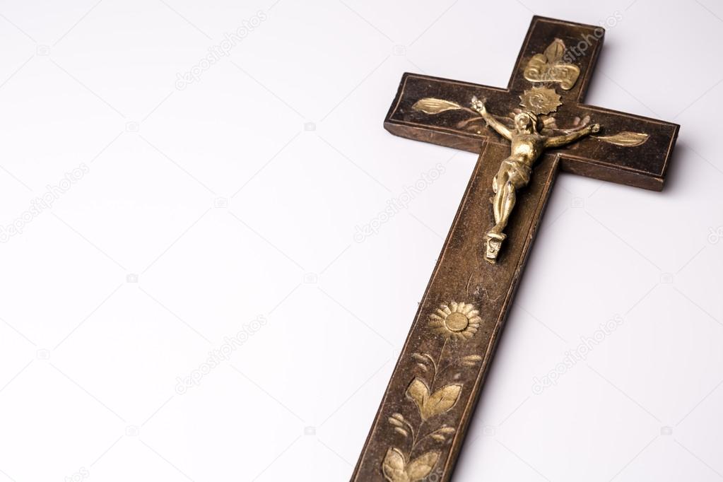 Crucifix with figure of Jesus on white background