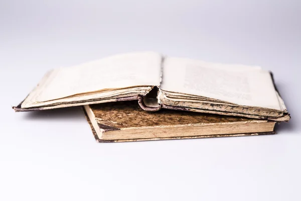 Beautiful old two books closeup on white background, one is open — Stock Photo, Image