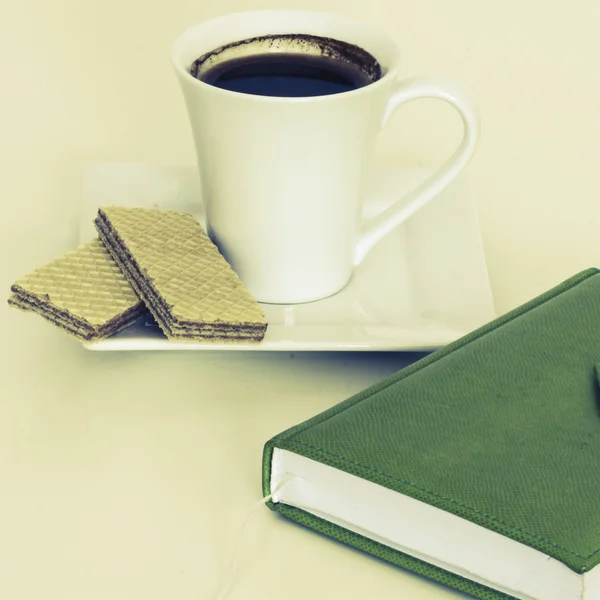 Cup of tea with notebook — Stock Photo, Image