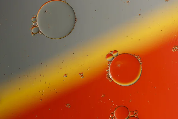 Oil drops on a water surface — Stock Photo, Image