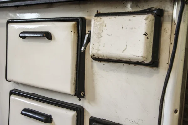 Old white metal oven — Stock Photo, Image