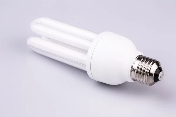 Energy efficient light bulb isolated on white — Stock Photo, Image