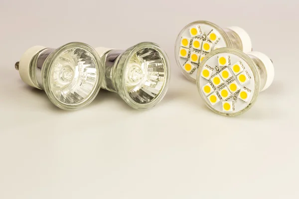 Modern LED bulbs with classic old bulbs — Stock Photo, Image