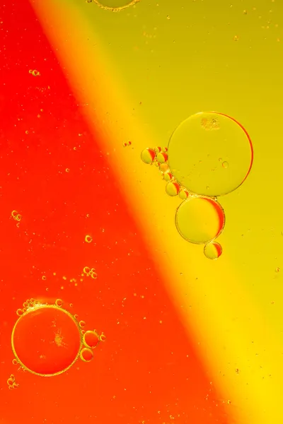 Oil drops on a water surface — Stock Photo, Image