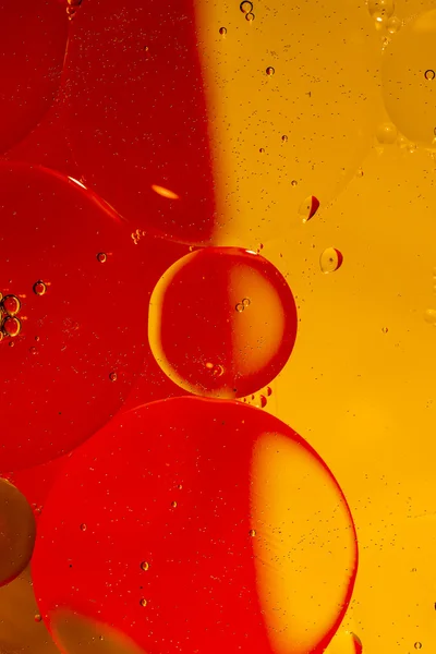 Oil drops on a water surface — Stock Photo, Image