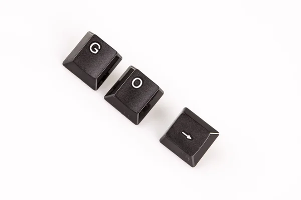 Beyaz siyah bilgisayar düğmeleri ile yazılmış kelime gitmek — Stok fotoğraf