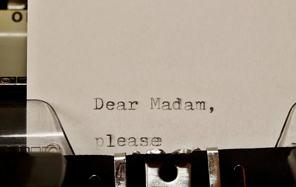 Text Dear madam typed on old typewriter — Stock Photo, Image