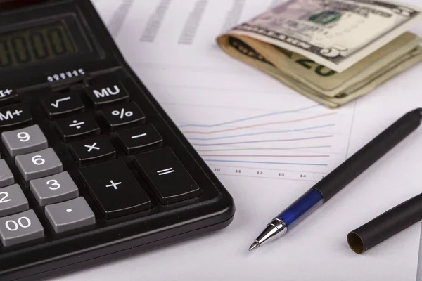 Business Charts with calculator, money and pen — Stock Photo, Image