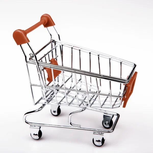 Shopping cart on white background — Stock Photo, Image