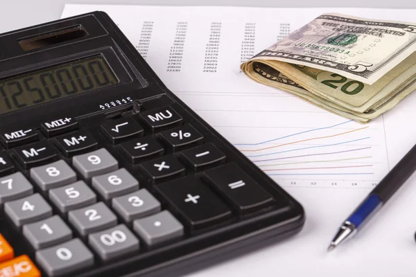 Business Charts with calculator, money and pen — Stock Photo, Image