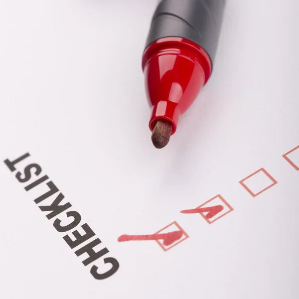 Checklist on white with marker — Stock Photo, Image