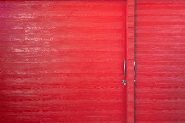 stock image Metal lock and door handle on the red wooden door. Abstract red wood planks background wall texture. Wooden texture red colour for backdrop. Red texture of pine wood grain panel with copy space.