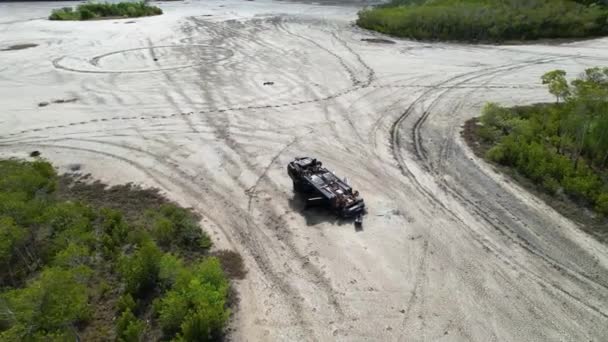 Drone Aerial Rusting Illegal Dump Car Wreck Tidal Salt Pans — Stok Video