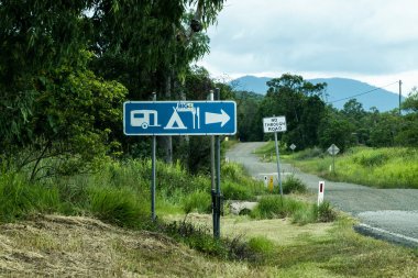 Airlie Beach, queensland, Australia - January 2022: Caravan park signage on a country road