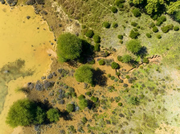 Drone aerial over water pond used for sapphire mining in central queensland gemfields Australia.