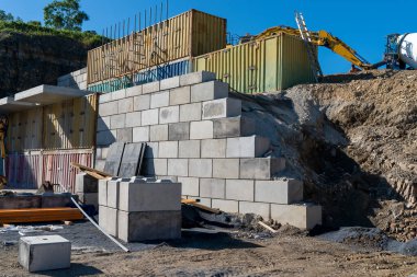 Mackay, Queensland, Australia - 7th June 2022: Infrastructure and the machinery working in a quarry producing industrial rock and stone for construction of roads and other purposes.