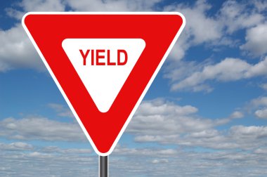 Yield Sign with Clouds clipart