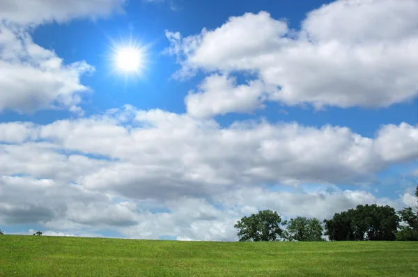 Landscape with clouds and trees — Stock Photo, Image