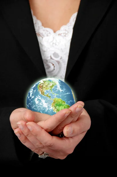 Business woman holding the earth — Stock Photo, Image
