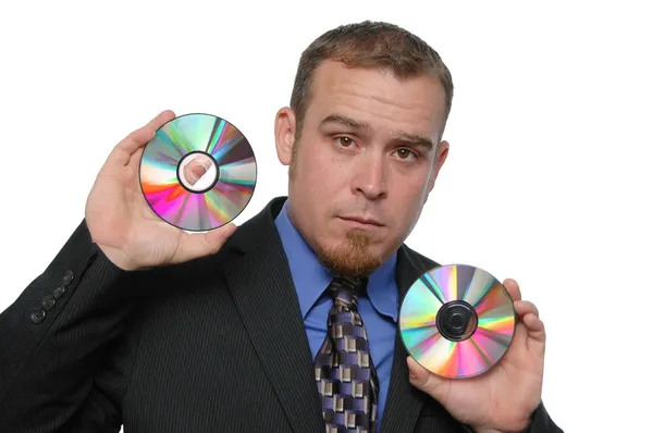 Geschäftsmann mit CDs — Stockfoto