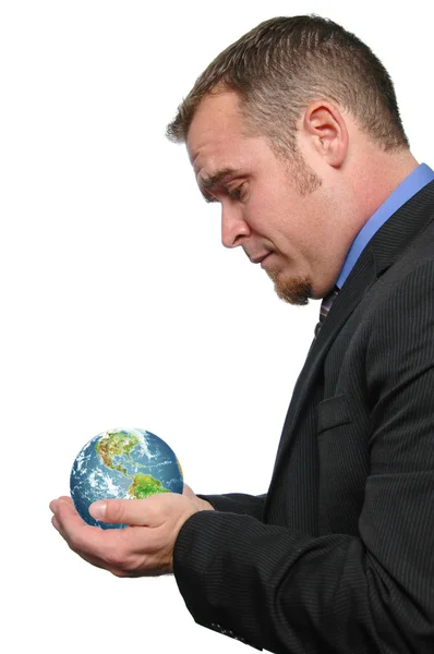 Businessman holding the world — Stock Photo, Image