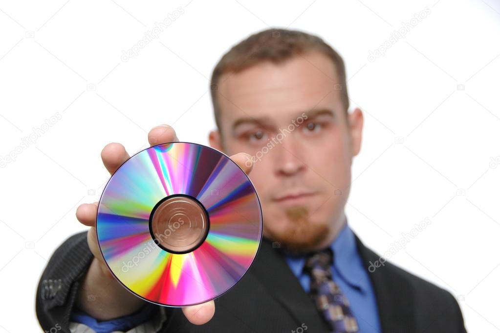 Businessman holding CD