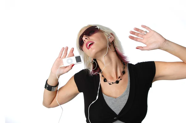 Blond enjoying music on her ipod — Stock Photo, Image