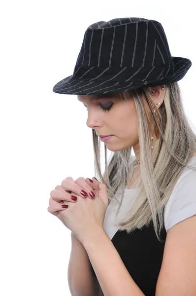 Girl with hat praying — Stock Photo, Image