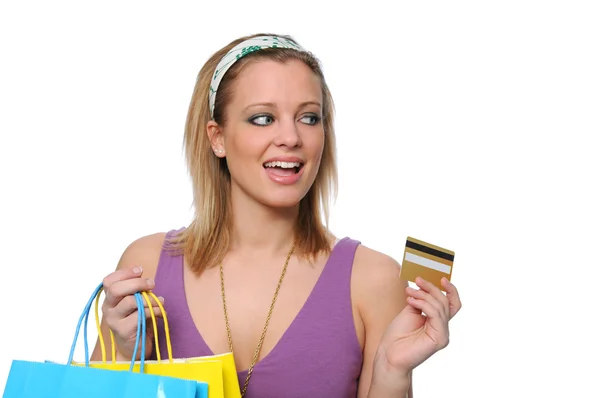 Compras adolescentes e payind com um cartão de crédito — Fotografia de Stock