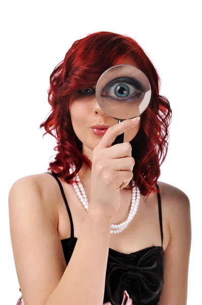 Woman with magnifying glass — Stock Photo, Image