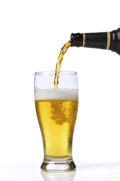Beer being pour on a glass — Stock Photo, Image